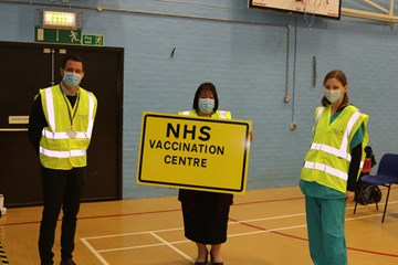 staff pose at Lords Meadow vaccination centre