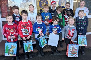 Scores of Christmas card designs adorn Tiverton market