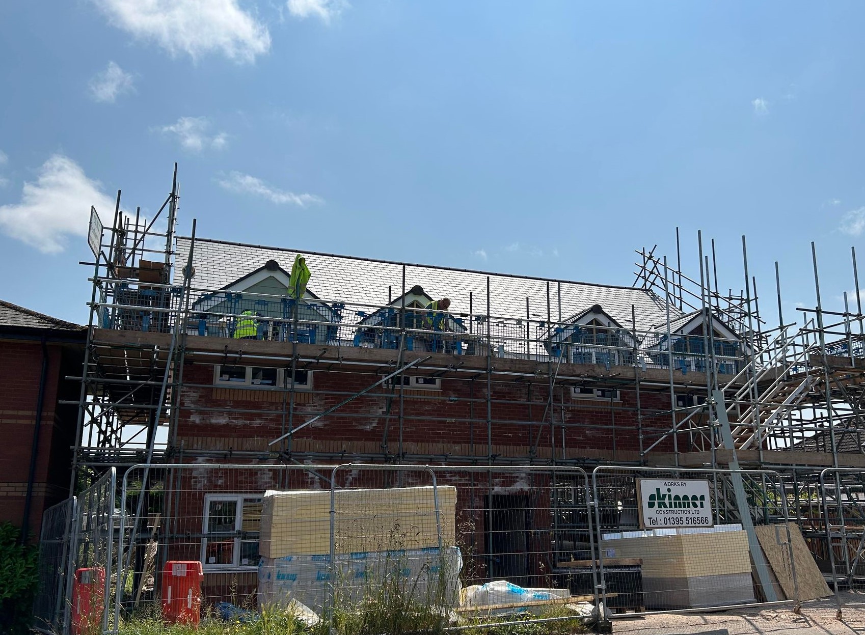 Tiverton Housing Development Reaches Milestone as Another Nears Completion